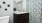 a bathroom with a mirror and sink